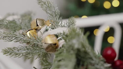Christmas Decorations with Gold Bells and Red Berries