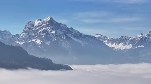 Ethereal Peaks over Walensee's Mist. Switzerland aerial
