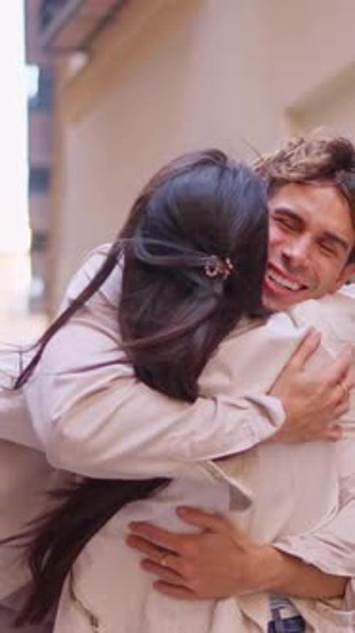 Two Happy Friends Hugging Tightly Outdoors