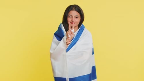 Young Adult Posing with the Israeli Flag