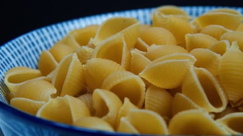 Bowl of Delicious Shell Pasta on Display