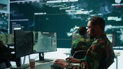 Soldiers Typing at Computers in Control Room