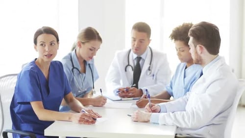 Hospital, Profession, People and Medicine Concept - Group of Doctors Meeting On