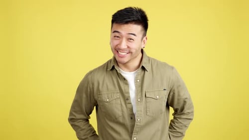 Smiling Young Adult Gives a Birthday Gift