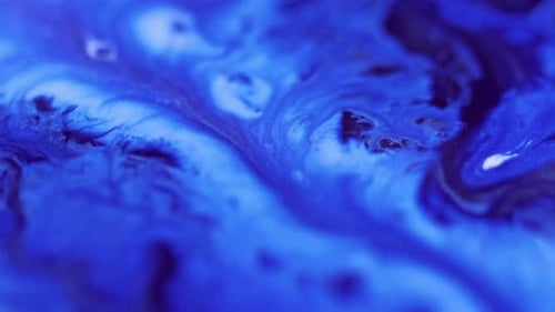 Abstract Fluid Ink Mixing Background in Blues