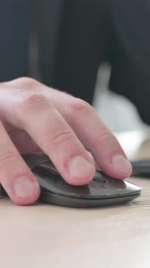 Close Up of Businessman Using Mouse of Computer, vertical video