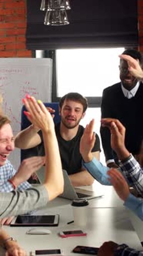 Celebration in Office Team Rejoicing After Project Success Office Team Celebrates with Enthusiasm