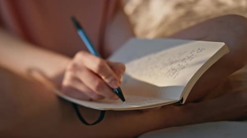 Hands Writing Personal Journal in Sunlight Closeup Calm Girl Rest Morning Bed