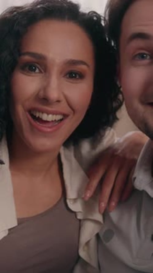 Smiling Caucasian Male Man with Hispanic Female Woman Talking Video Call Home Webcam View Happy