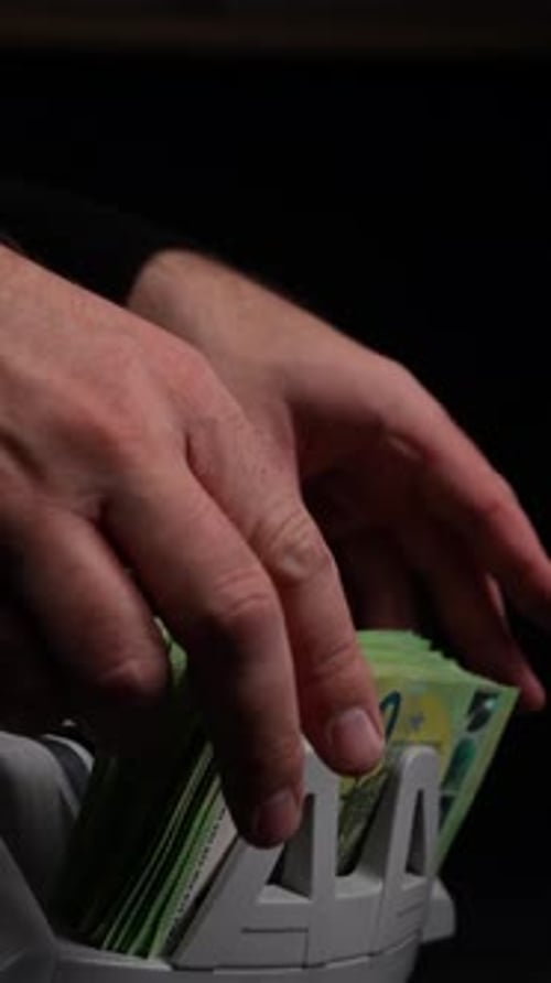 Euro Banknotes Being Sorted By Money Counting Machine