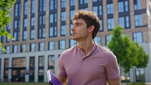 Serious Employee Walking Urban District Receiving Bad News on Cellphone Closeup