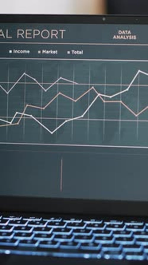 Vertical Video Financial Annual Report Charts on Notebook Screen in Office Close Up Shot