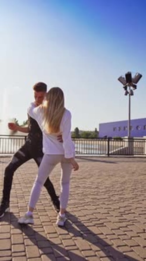 Modern dancers are dancing in the street. Urban lifestyle. Hip-hop generation.