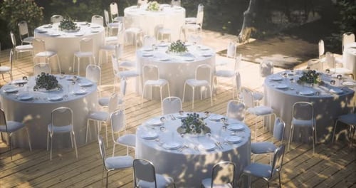 Outdoor Dining Setup for a Formal Event in a Beautiful Garden Space