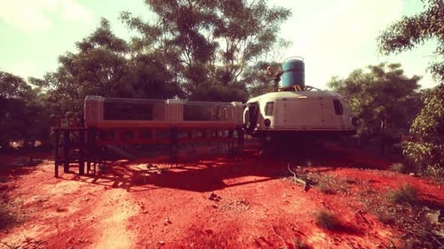 Building That Seems to Float in the Green Surface of the Forest