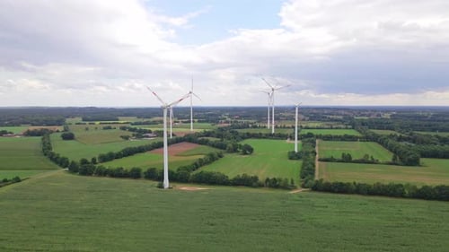 Wind turbines next to highway