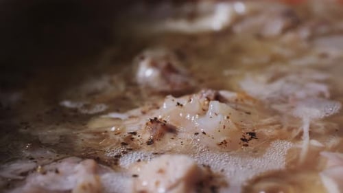 Simmering Food with Seasonings, Close-Up Shot