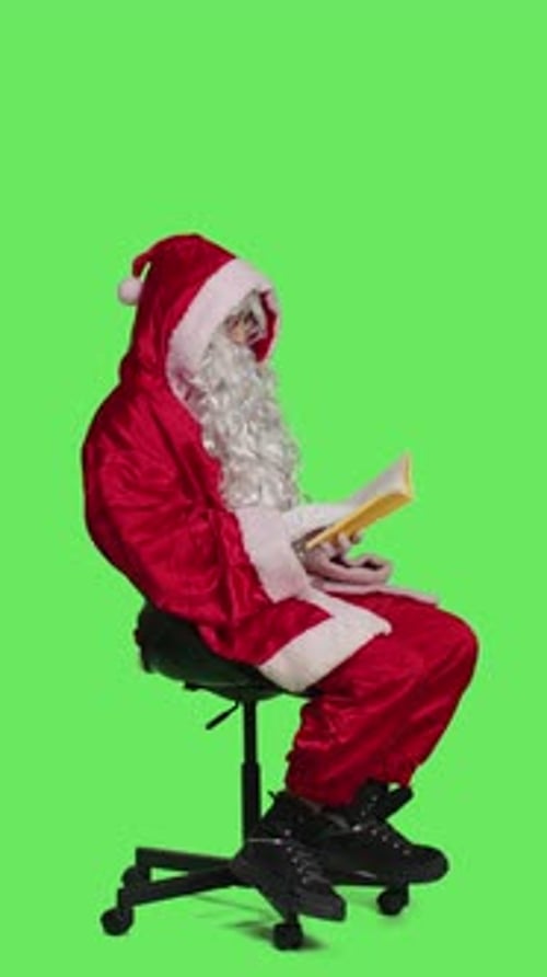 Vertical Video Side View of Young Man Reading Poetry Book
