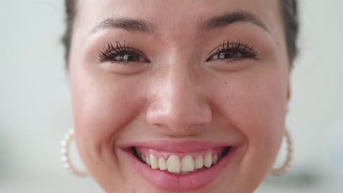 Close Up Portrait of an Asian Woman Happy Eyes Looking Into the Camera Close Up Emotions