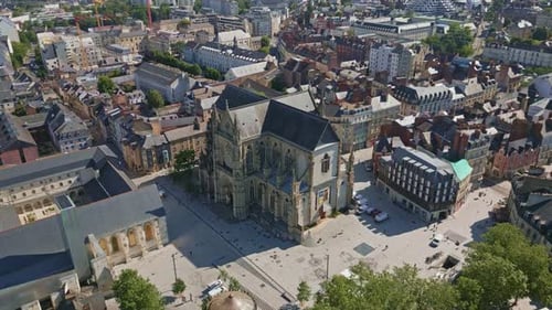 Basilica Saint-Aubin in Place Sainte Anne square and Jacobins convent in Rennes, France. Aerial dron