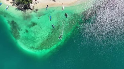 Gili Nanggu Island Aerial panorama of white sand and shallow reefs near Lombok coast