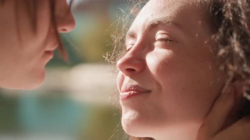 Happy Couple Dreaming Woman and Partner Share Tender Moment By Lake Sunlight Couple Expressing