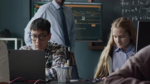 Diverse Students Having Engineering Lesson at School