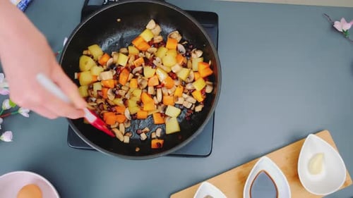 Stir Frying Vegetables in a Frying Pan