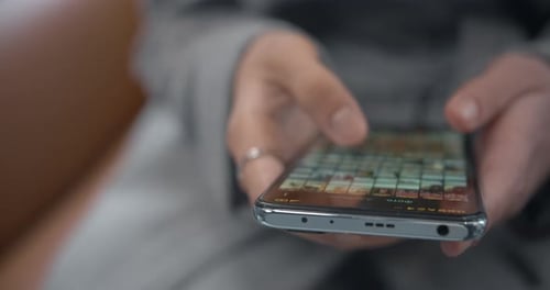 Hands Using Phone Close Up