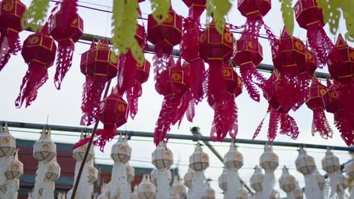 Hanging one hundred of multi colours lantern light lamp for Loy Krathong Festival in Lampune.