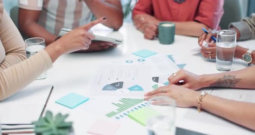 Team Reviewing Data at Conference Table