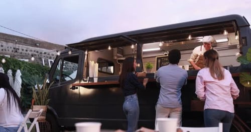 Multiracial People Ordering Gourmet Meal In Front Of Food Truck Outdoor - Multigeneratiol Friends...