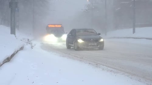 Snow Storm in City Traffic
