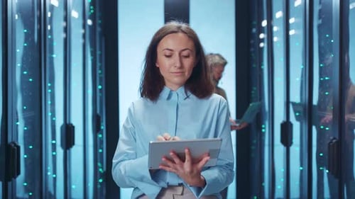 Skilled Professionals Work in a Hightech Data Center Using Advanced Tech to Enhance Efficiency