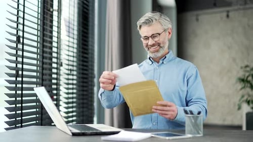 Man Receives Good News in Office Setting