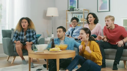 Friends Watching Sports Game Celebrate Goal at Home