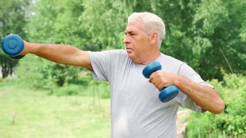 Senior Man Working Out Outdoors Person Lifting Dumbbells Old Male Exercising at Park Healthy People