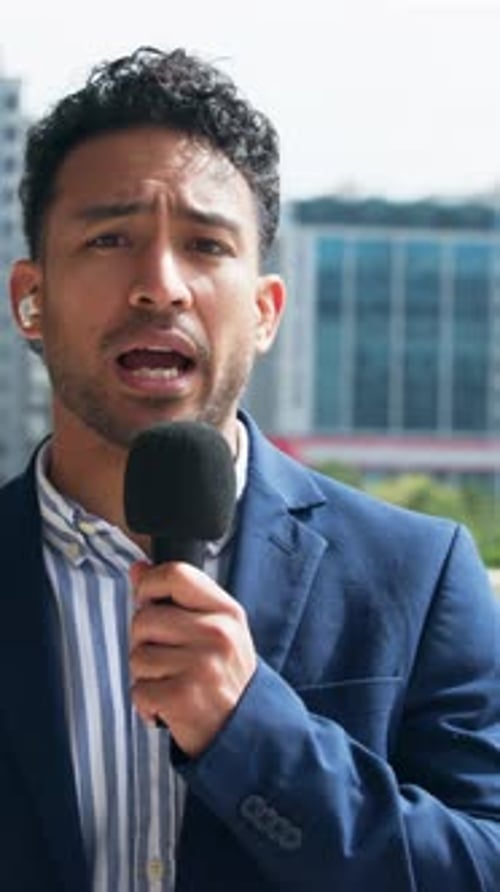 Face, anchor and man with mic in city, explaining story and live report for breaking news coverage