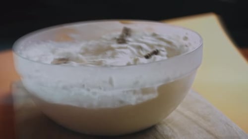 Old Time Custard Ice Cream with Pieces of Chocolate and Walnut