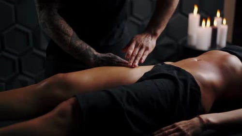 Woman Receives Calming Leg Massage at Spa
