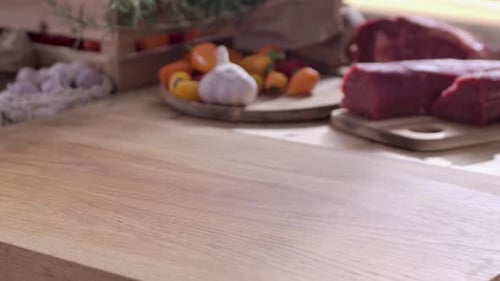 Raw Beef Preparation on Wooden Cutting Board
