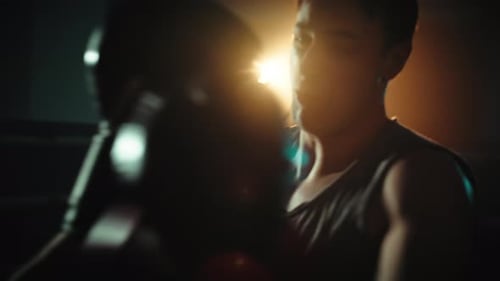 Fighters Sport Punching Competition on the Ring of the Gym