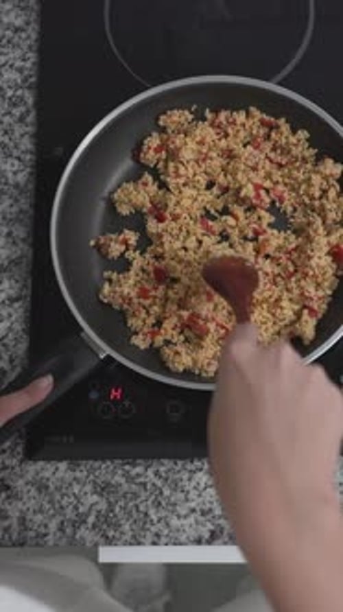 Cooking Food in a Pan on the Stove
