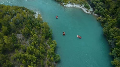 group rafting on river with aerial drone view