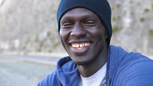 Cheerful Man Smiling Close Up in the City