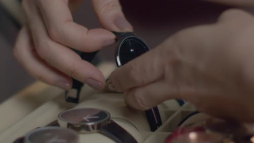 Hands Select Stylish Wristwatch From Box