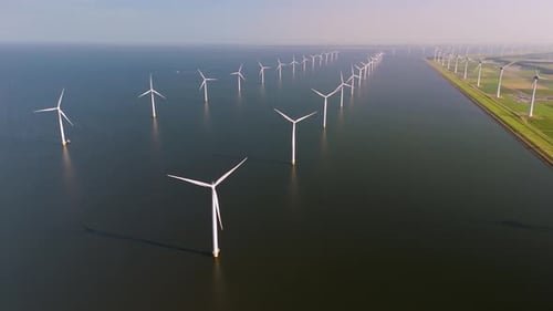 Captivating Windmill Turbines Harnessing Energy in the Serene Waters of the Netherlands