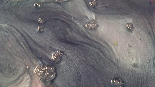 Abstract Silver Liquid Swirls with Bubbles