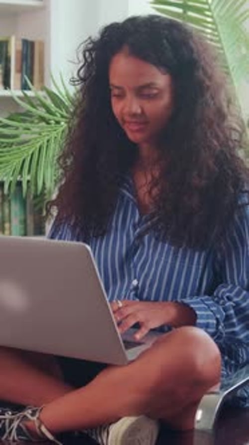 Young Happy Casual Indian Woman Freelancer Performs Remote Work Via Laptop