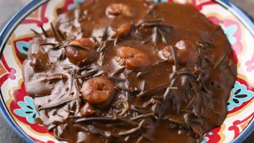 Delicious Brown Gravy Dish with Rosemary and Shrimp